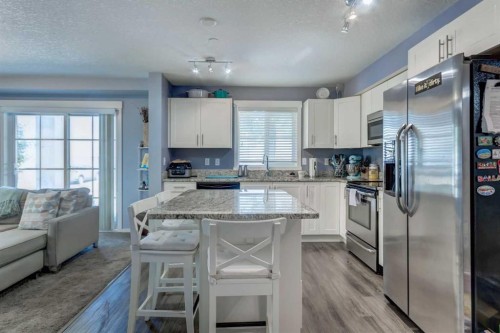 2114-755 Copperpond Boulevard Se, Calgary, AB - Indoor Photo Showing Kitchen With Stainless Steel Kitchen