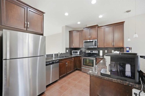 402 Wentworth Villas Sw, Calgary, AB - Indoor Photo Showing Kitchen With Stainless Steel Kitchen With Double Sink