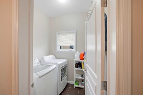 402 Wentworth Villas Sw, Calgary, AB - Indoor Photo Showing Laundry Room