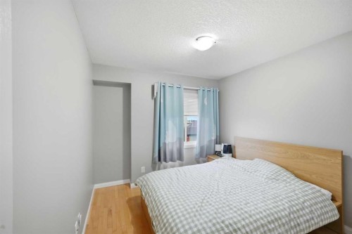 402 Wentworth Villas Sw, Calgary, AB - Indoor Photo Showing Bedroom