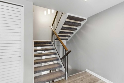 57-2225 Oakmoor Drive Sw, Calgary, AB - Indoor Photo Showing Other Room