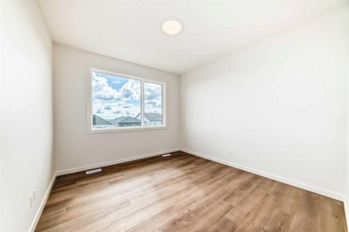 46 Verdure Place Sw, Calgary, AB - Indoor Photo Showing Other Room