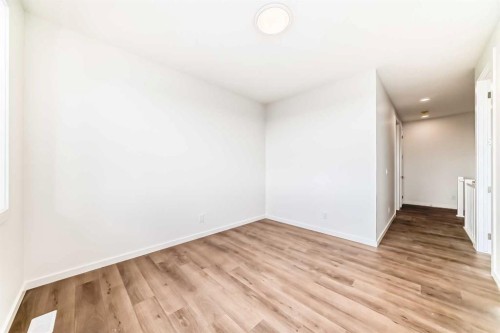 46 Verdure Place Sw, Calgary, AB - Indoor Photo Showing Other Room