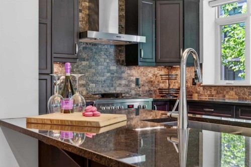 102-211 Quarry Way Se, Calgary, AB - Indoor Photo Showing Kitchen With Upgraded Kitchen