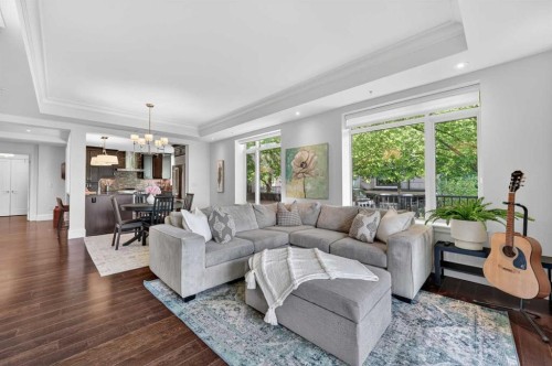 102-211 Quarry Way Se, Calgary, AB - Indoor Photo Showing Living Room