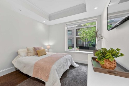 102-211 Quarry Way Se, Calgary, AB - Indoor Photo Showing Bedroom