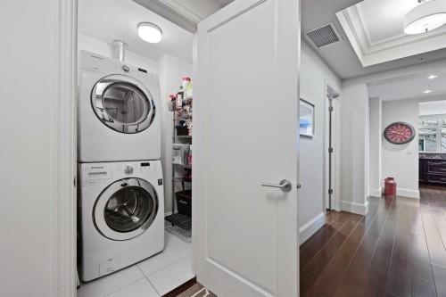 102-211 Quarry Way Se, Calgary, AB - Indoor Photo Showing Laundry Room
