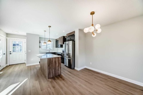 903 Clover Road, Carstairs, AB - Indoor Photo Showing Kitchen With Stainless Steel Kitchen