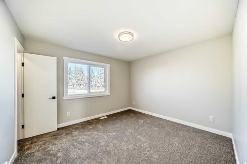 903 Clover Road, Carstairs, AB - Indoor Photo Showing Other Room