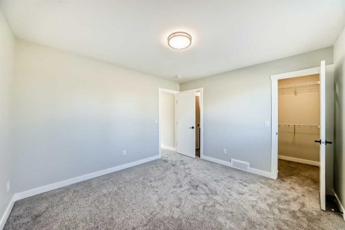 903 Clover Road, Carstairs, AB - Indoor Photo Showing Other Room