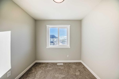 903 Clover Road, Carstairs, AB - Indoor Photo Showing Other Room