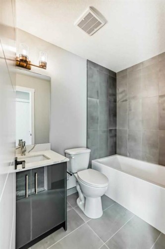 903 Clover Road, Carstairs, AB - Indoor Photo Showing Bathroom