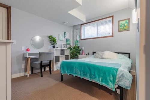 6 Cranwell Link Se, Calgary, AB - Indoor Photo Showing Bedroom