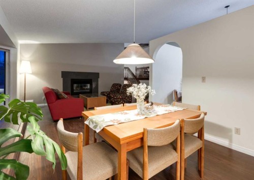 63 Brookpark Crescent Sw, Calgary, AB - Indoor Photo Showing Dining Room With Fireplace