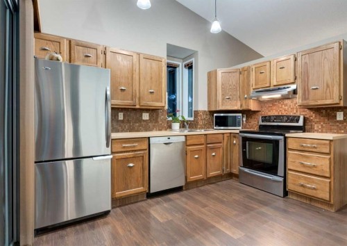 63 Brookpark Crescent Sw, Calgary, AB - Indoor Photo Showing Kitchen With Stainless Steel Kitchen