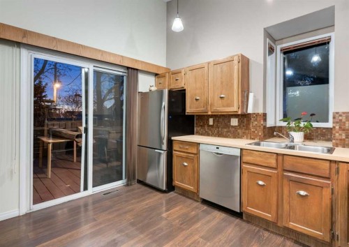 63 Brookpark Crescent Sw, Calgary, AB - Indoor Photo Showing Kitchen With Double Sink