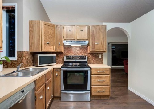 63 Brookpark Crescent Sw, Calgary, AB - Indoor Photo Showing Kitchen With Double Sink