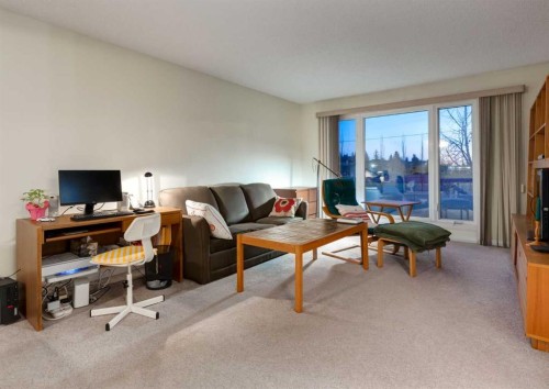 63 Brookpark Crescent Sw, Calgary, AB - Indoor Photo Showing Living Room