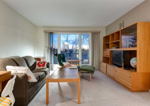 63 Brookpark Crescent Sw, Calgary, AB - Indoor Photo Showing Living Room