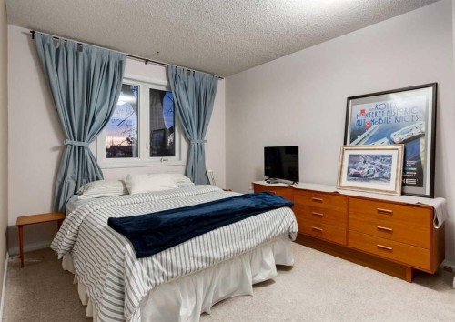 63 Brookpark Crescent Sw, Calgary, AB - Indoor Photo Showing Bedroom