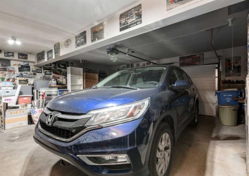 63 Brookpark Crescent Sw, Calgary, AB - Indoor Photo Showing Garage