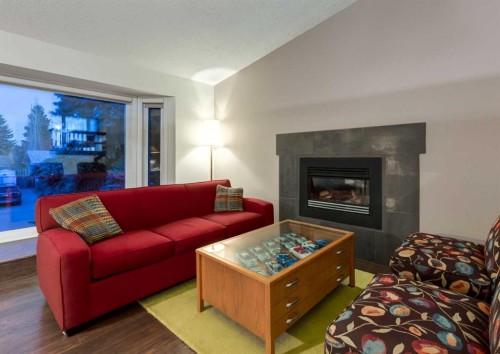 63 Brookpark Crescent Sw, Calgary, AB - Indoor Photo Showing Living Room With Fireplace