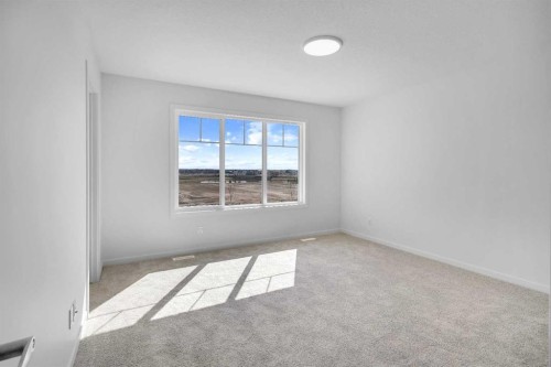 541 Bayview Street Sw, Airdrie, AB - Indoor Photo Showing Other Room