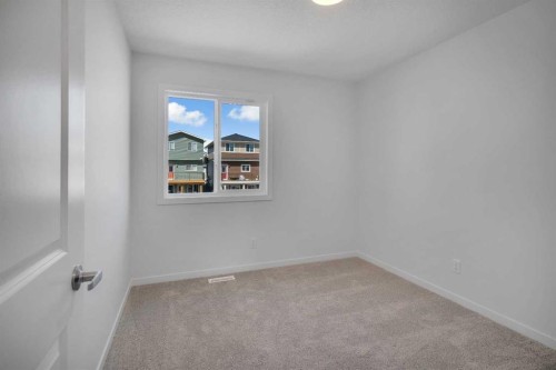 541 Bayview Street Sw, Airdrie, AB - Indoor Photo Showing Other Room