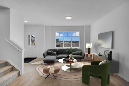 541 Bayview Street Sw, Airdrie, AB - Indoor Photo Showing Living Room