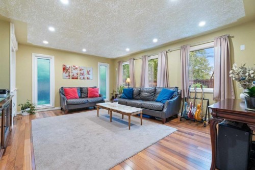 411 Wilderness Place Se, Calgary, AB - Indoor Photo Showing Living Room