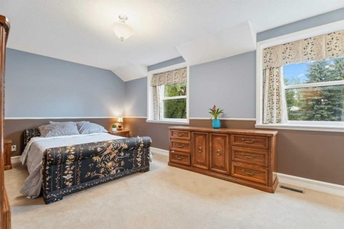 411 Wilderness Place Se, Calgary, AB - Indoor Photo Showing Bedroom