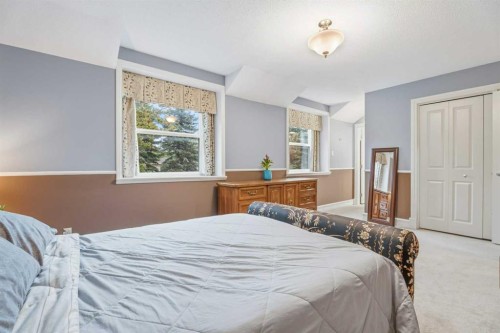 411 Wilderness Place Se, Calgary, AB - Indoor Photo Showing Bedroom