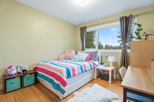 411 Wilderness Place Se, Calgary, AB - Indoor Photo Showing Bedroom