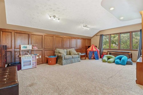 411 Wilderness Place Se, Calgary, AB - Indoor Photo Showing Bedroom