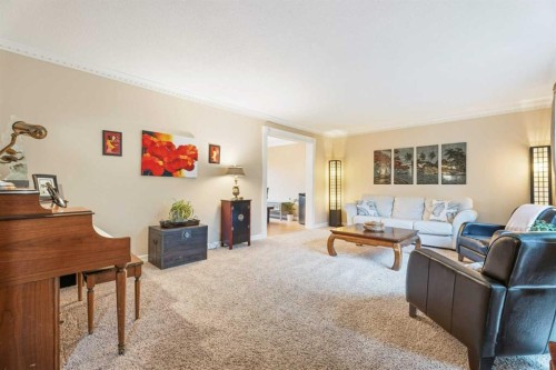 411 Wilderness Place Se, Calgary, AB - Indoor Photo Showing Living Room