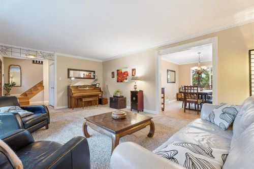 411 Wilderness Place Se, Calgary, AB - Indoor Photo Showing Living Room