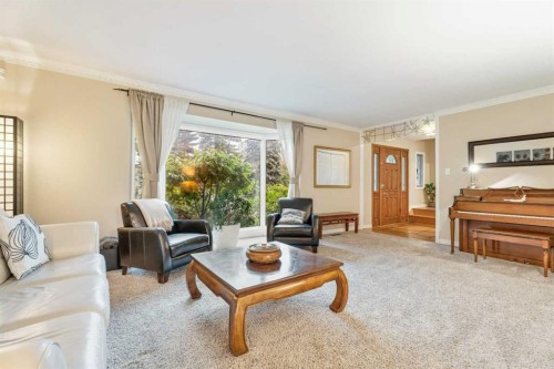 411 Wilderness Place Se, Calgary, AB - Indoor Photo Showing Living Room