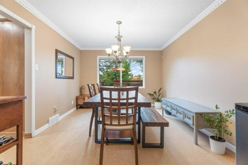 411 Wilderness Place Se, Calgary, AB - Indoor Photo Showing Dining Room