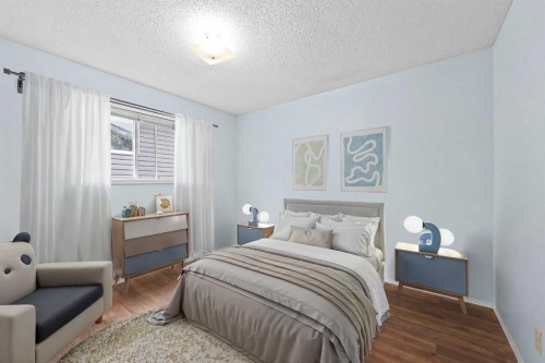 159 Shawinigan Drive Sw, Calgary, AB - Indoor Photo Showing Bedroom