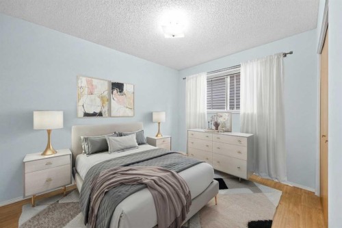 159 Shawinigan Drive Sw, Calgary, AB - Indoor Photo Showing Bedroom