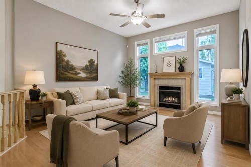 41 Cranston Drive Se, Calgary, AB - Indoor Photo Showing Living Room With Fireplace