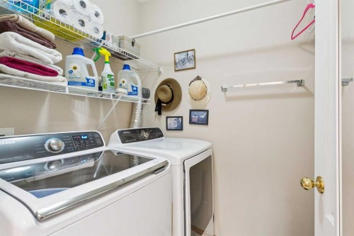 23 Tuscarora Close Nw, Calgary, AB - Indoor Photo Showing Laundry Room