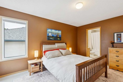 23 Tuscarora Close Nw, Calgary, AB - Indoor Photo Showing Bedroom