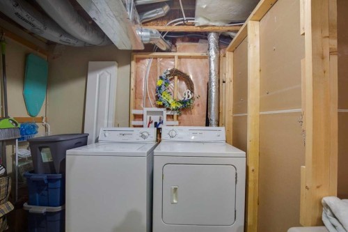 23 Tuscarora Close Nw, Calgary, AB - Indoor Photo Showing Laundry Room