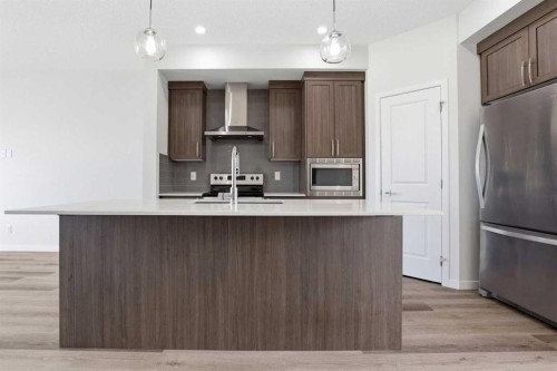 352 Dawson Drive, Chestermere, AB - Indoor Photo Showing Kitchen With Upgraded Kitchen