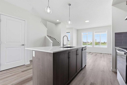 352 Dawson Drive, Chestermere, AB - Indoor Photo Showing Kitchen With Upgraded Kitchen