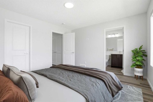 352 Dawson Drive, Chestermere, AB - Indoor Photo Showing Bedroom