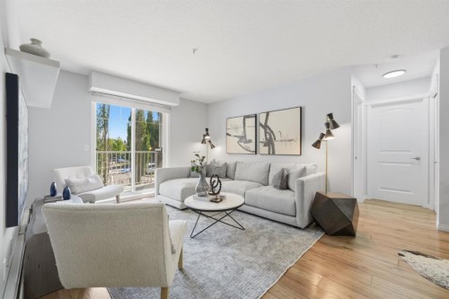 2223-115 Prestwick Villas Se, Calgary, AB - Indoor Photo Showing Living Room