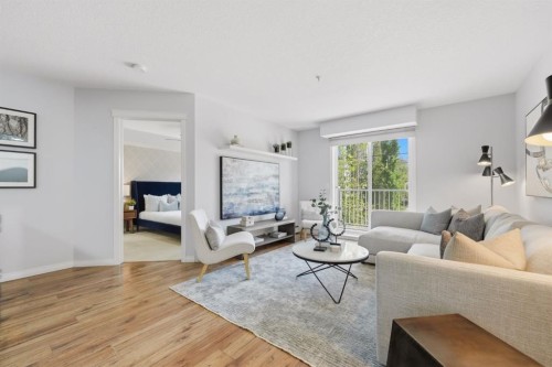 2223-115 Prestwick Villas Se, Calgary, AB - Indoor Photo Showing Living Room