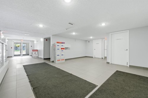 2223-115 Prestwick Villas Se, Calgary, AB - Indoor Photo Showing Other Room